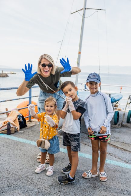 people at a beach cleanup in kostrena croatia