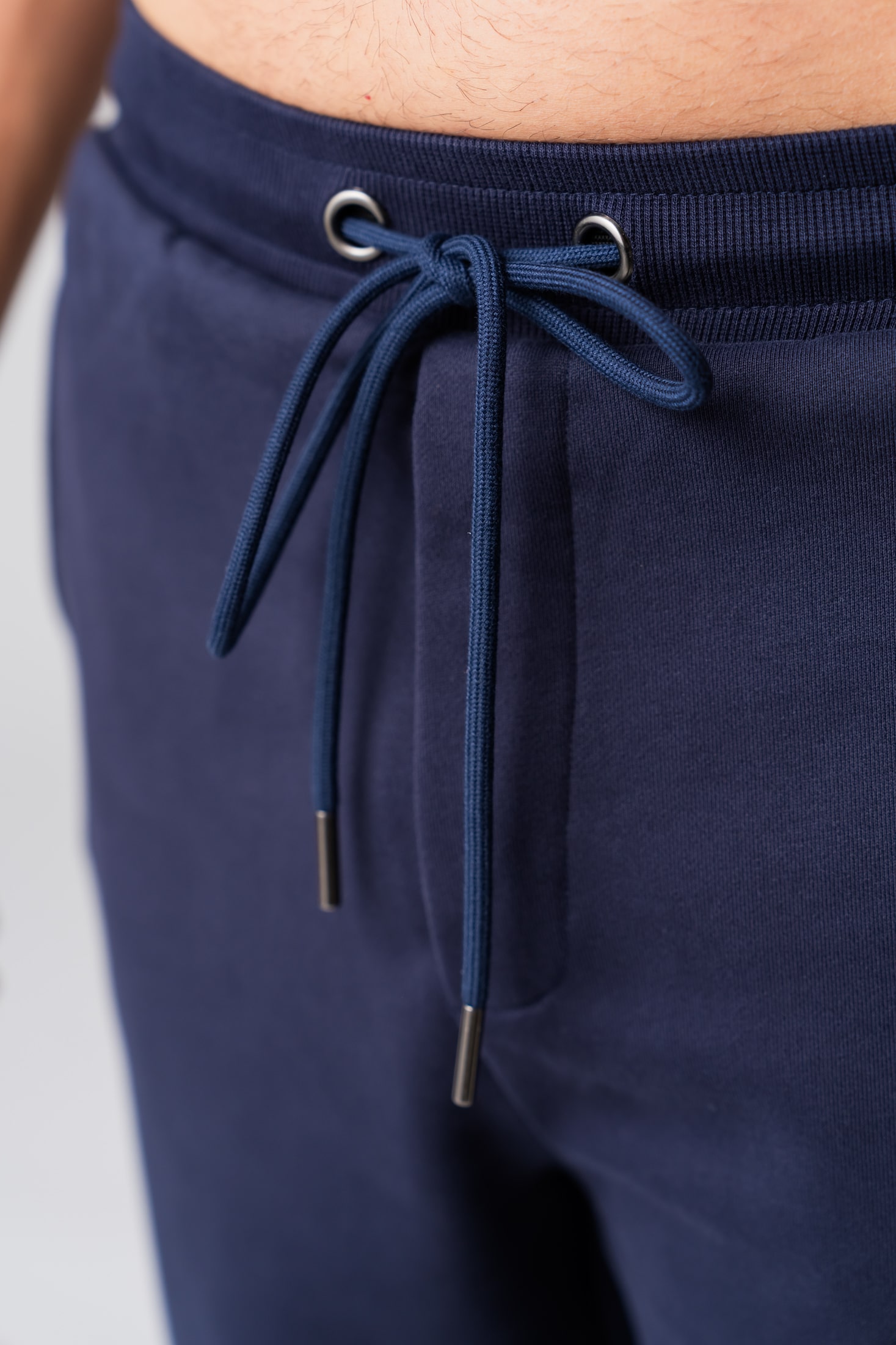 Men's navy 100% cotton sweatpants with a drawstring waist