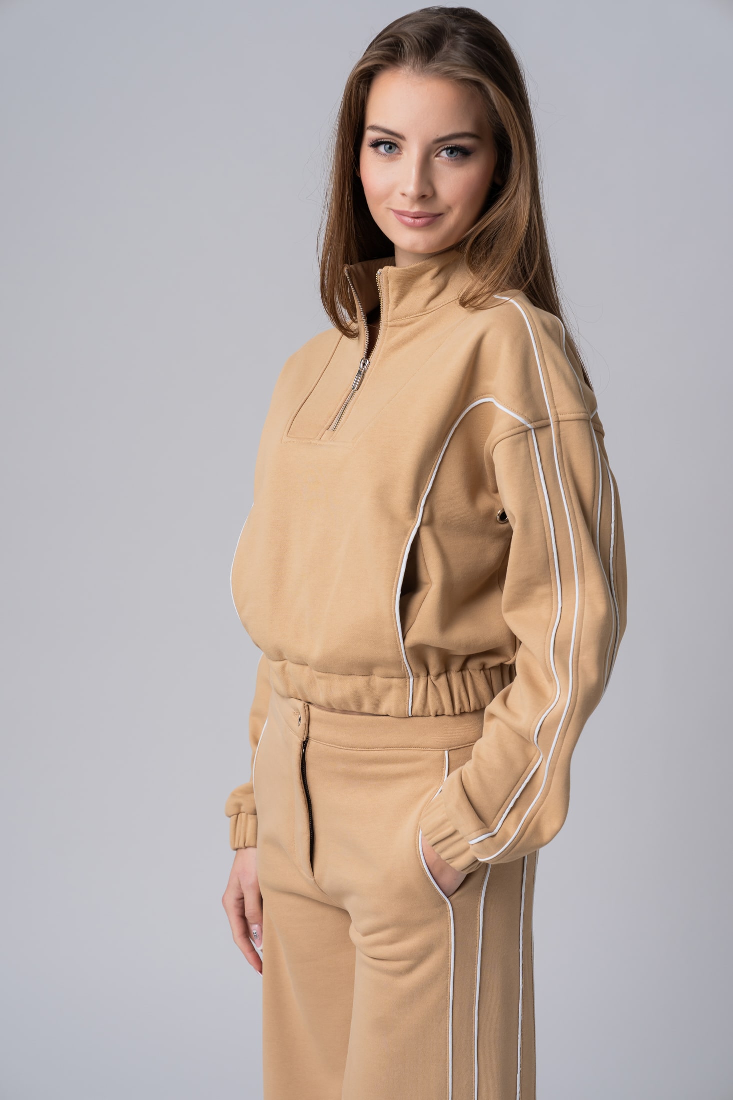 Women’s beige 100% cotton relaxed active wear with white contrast stripes