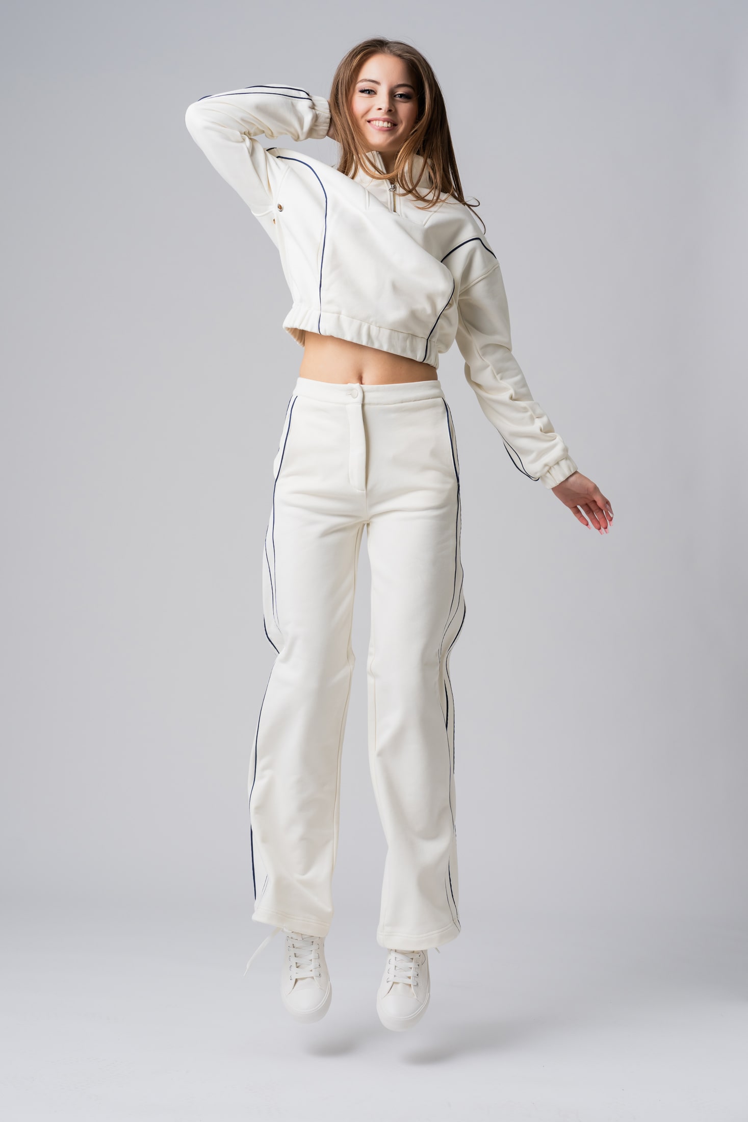 Women’s white 100% cotton relaxed fit active wear with black contrast stripes