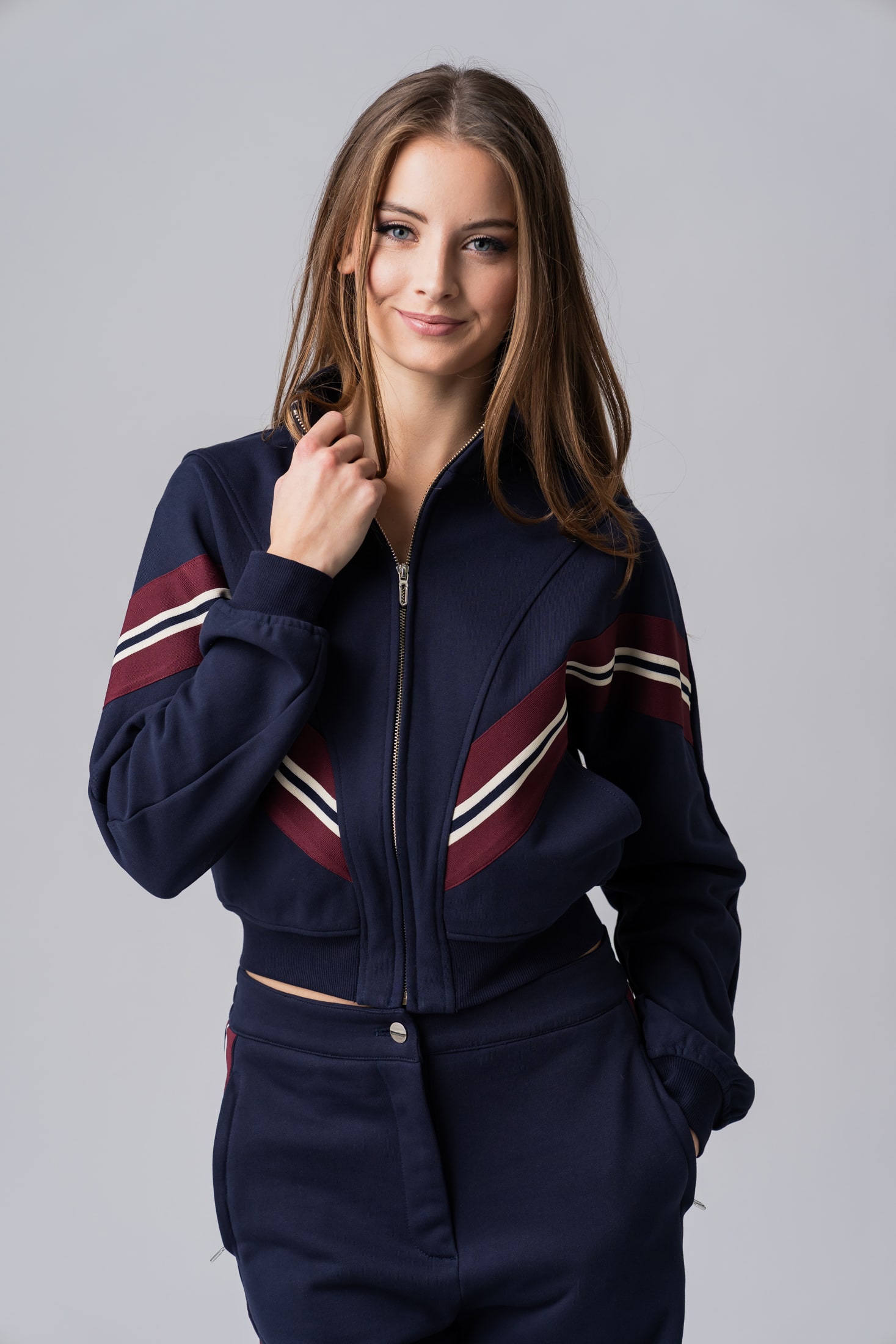 Women's navy zipped sweatshirt with red and white stripes made from 100% cotton