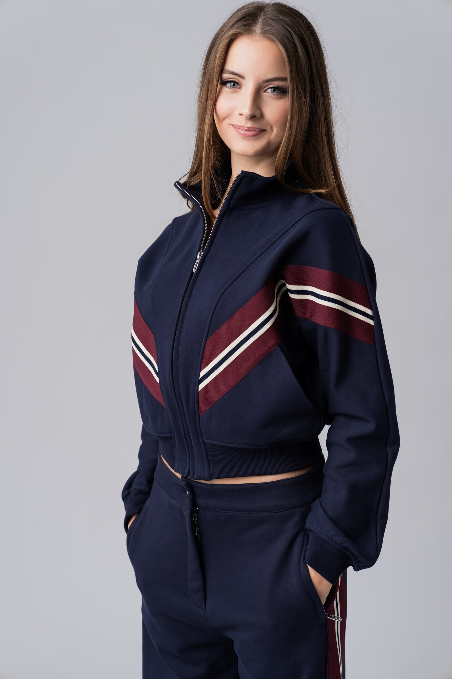 Ženski tamnoplavi gornji dio trenirke od 100% pamuka s crvenim i bijelim prugama i patentnim zatvaračem