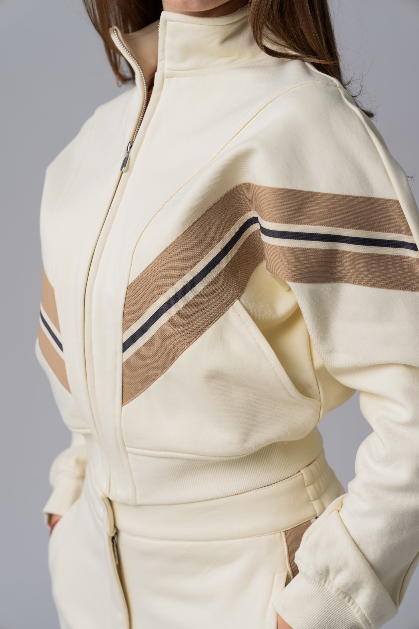 Women's white 100% cotton tracksuit top with beige and black stripes and full zipper