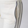 Women’s white 100% cotton high-waist sweatpants with black contrast piping and side pockets