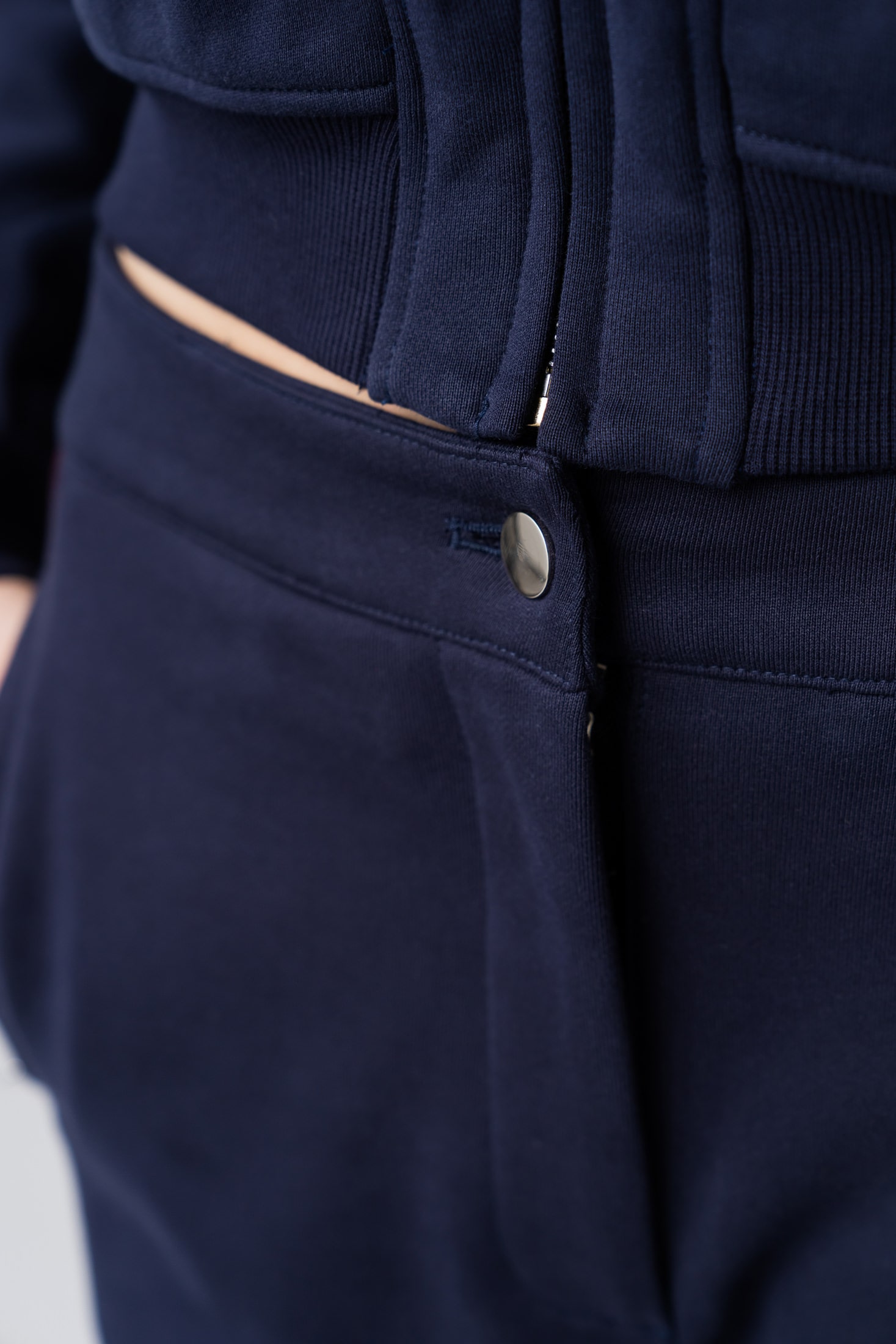 Women's 100% cotton navy sweatpants with a buttoned waist