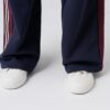Women's wide leg navy sweatpants with red and white stripes made from 100% cotton
