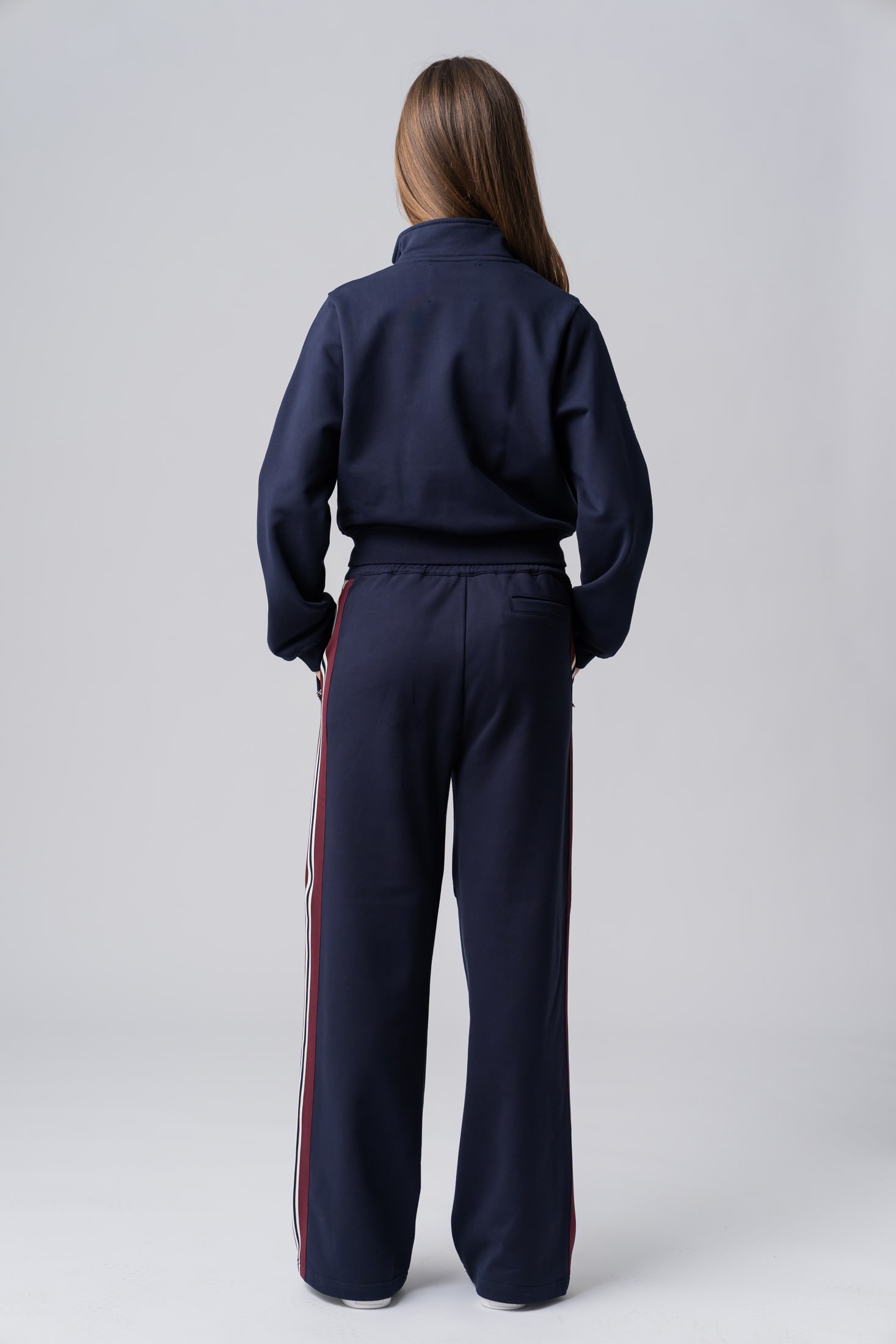 Women's navy tracksuit with red and white stripes made from 100% cotton
