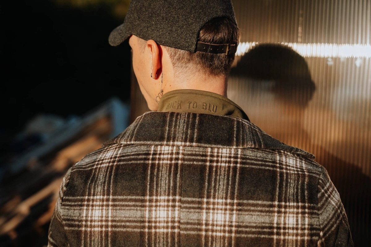 Detail of cotton garment construction showing durable stitching and responsible clothing design.