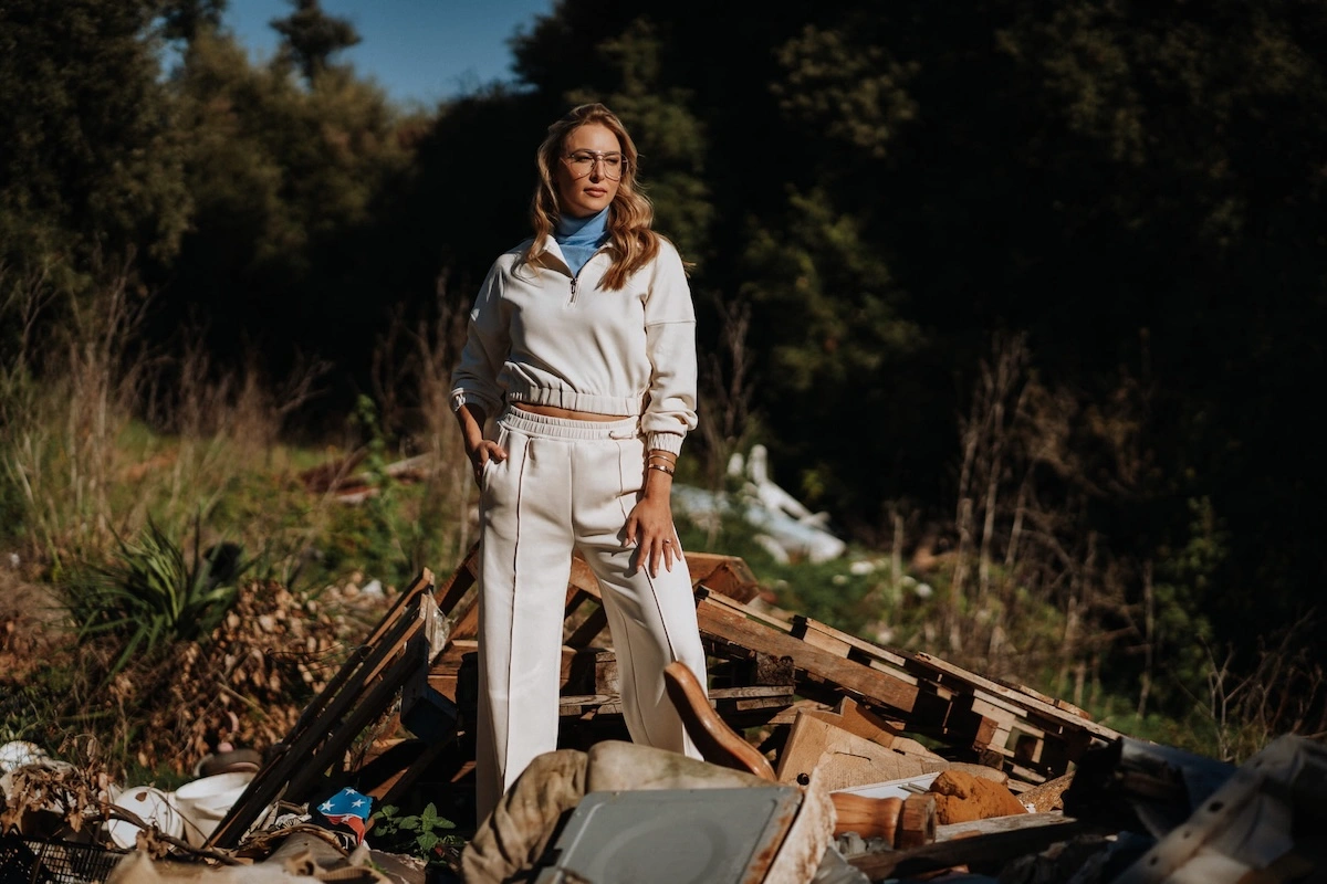 Woman wearing minimalist cotton loungewear representing slow fashion and long lasting everyday clothing.